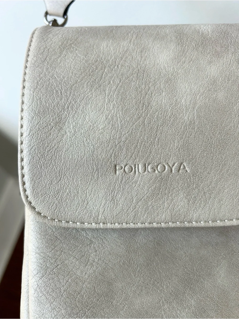 Poiugoya light tan small crossbody travel bag
